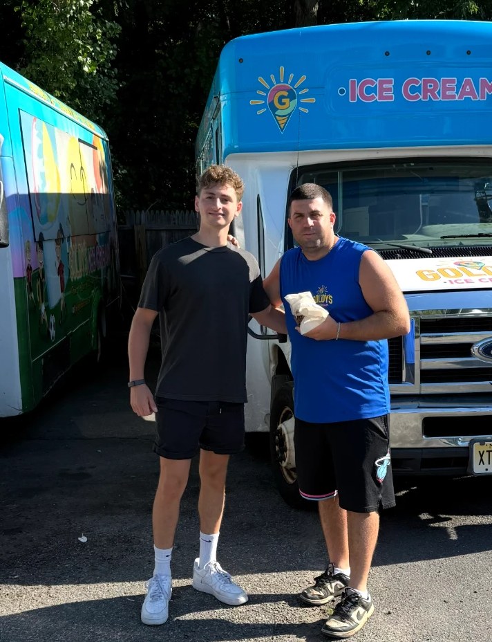 Tap-Tap founder with the owner of Goldy's Ice Cream in front of their trucks